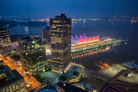 Vancouver skyline with Canada Place at night, aerial view | Stock image ...