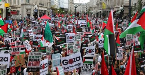 Palestine supporters march in London, BBC office daubed in red paint ...