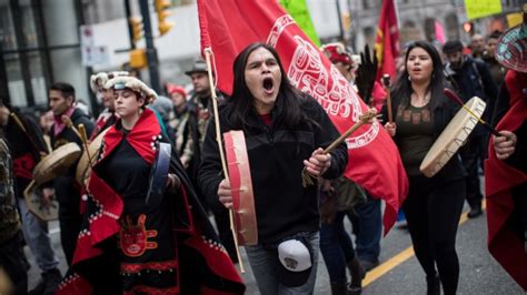 Hundreds march through downtown Vancouver after pipeline protesters ...