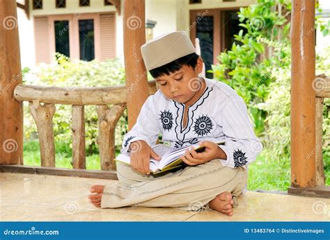 Child Reading Koran, Indonesia Stock Photo - Image of asian, indonesia ...