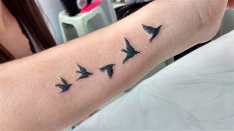 Birds tattoo | Simple tattoos for women, Black bird tattoo, Tattoos