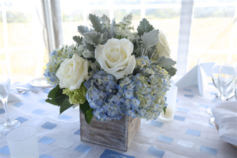 Hydrangea Centerpiece | Baby shower flowers, Wedding centerpieces, Hydrangea centerpiece