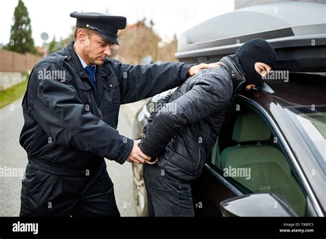 Police catch thief hi-res stock photography and images - Alamy