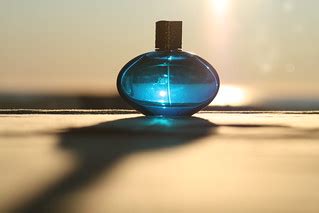 Perfume bottle | Placed on a table, with the sun shining str… | Flickr