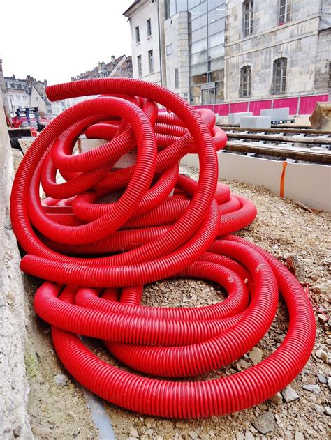 red flexible hose on ground free image | Peakpx