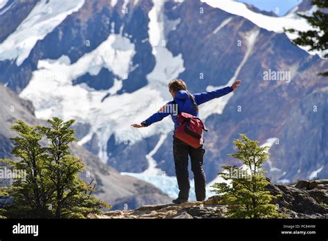 Woman hiking at Cerro Fitz Roy, Los Glaciares National Park, El Chaltén ...