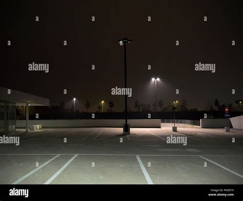 empty parking lot at night Stock Photo - Alamy