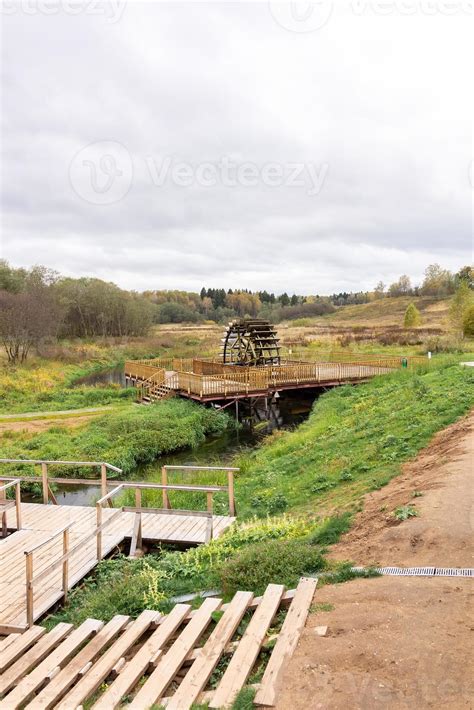 Traditional iron water mill wheel 13621623 Stock Photo at Vecteezy