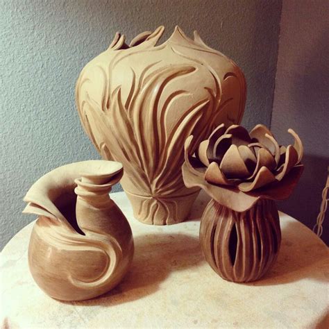 beautiful carved pottery flowing lines and curves, nouveau organic style. Does anyone know the ...