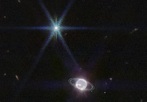 Images show rings of Neptune, solar system's outermost planet, with ...