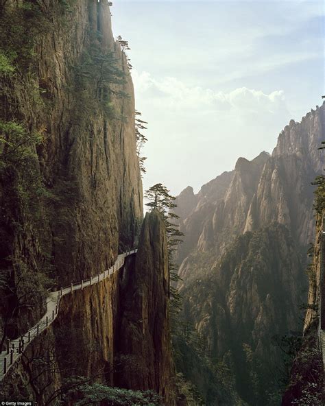 InPic: a wooden walkway winding along the cliffs of the Huangshan ...