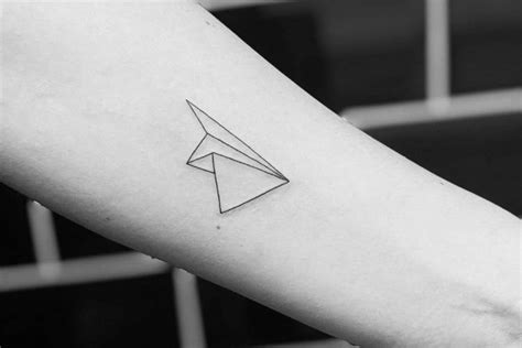 Paper airplane tattoo: learn the meaning and find some beautiful ideas