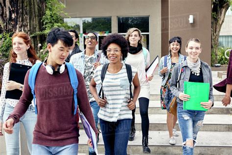 College students walking on campus - Stock Photo - Dissolve