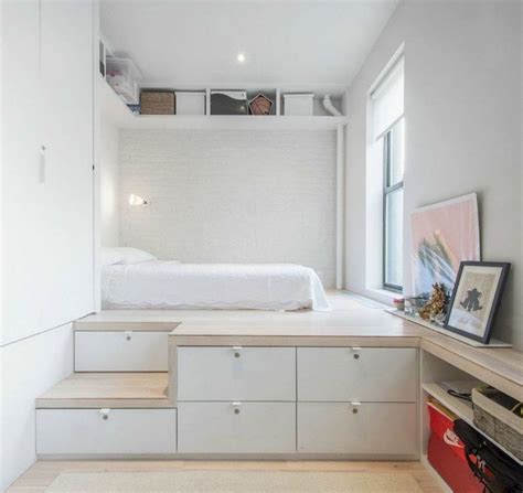 This enviable platform bed provides plenty of built-in storage. | Tiny bedroom design, Small ...