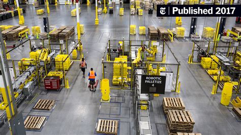 As Amazon Pushes Forward With Robots, Workers Find New Roles - The New York Times