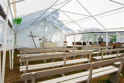 Pulpit, cross and benches at a tent revival. - Point of View - Point of ...