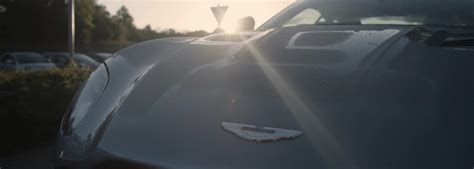 Aston Martin Logo Meaning Explained | Wings, Badge Symbol | Pictures