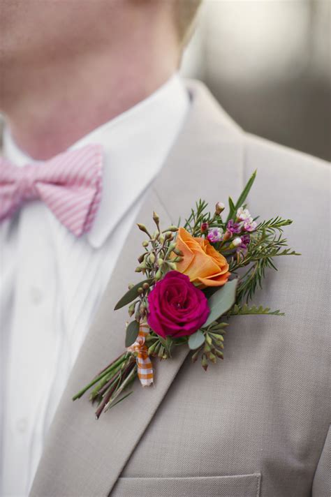 Orange and Fuschia Grooms Boutonniere | OneWed.com