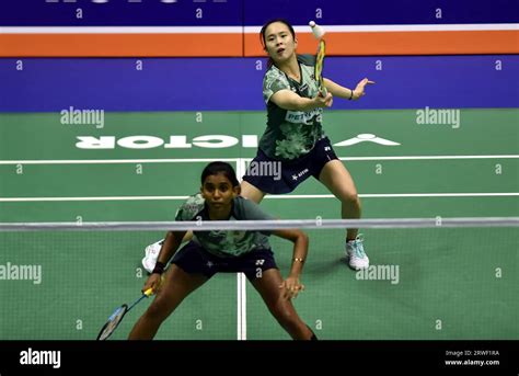 Malaysian badminton players Pearly Tan, Thinaah Muralitharan defeat ...