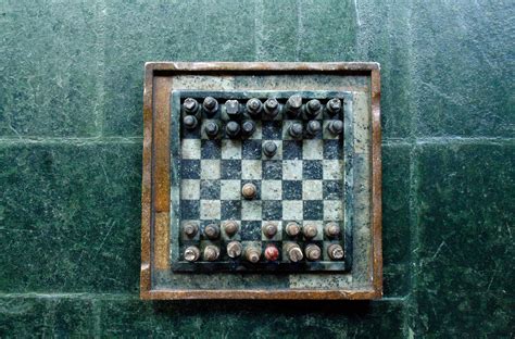 Chessboard on Green Surface · Free Stock Photo
