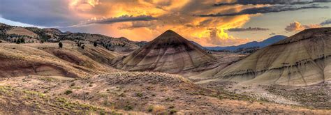 Sunset Over Painted Hills In Oregon Photograph by JPLDesigns