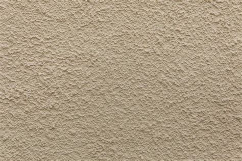 Beige painted stucco wall. Background texture — Stock Photo © wrangel #125646866