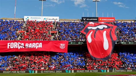 Barcelona wear Rolling Stones inspired kit - as Jagger and Wood spotted in stands at El Clasico ...