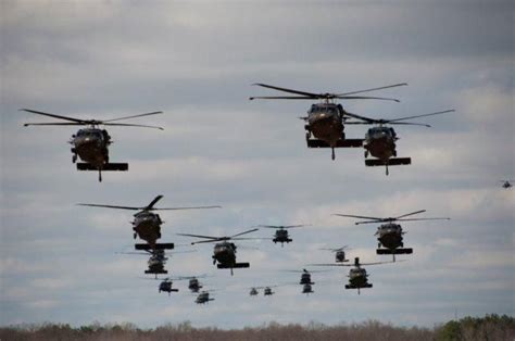 Sikorsky UH-60 Black Hawk helicopters in formation. | Helicopters | Black hawk helicopter, Black ...