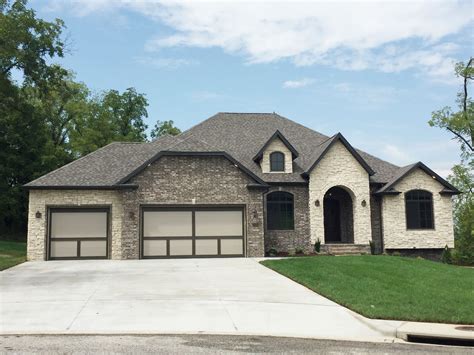 We loved the look of Acme Brick Spanish Bay with the cream stone. Beautiful home exterior ...