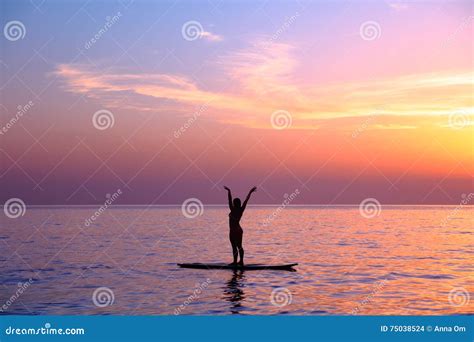 Doing Yoga Asanas on the Beach Stock Photo - Image of fitness, mountain: 75038524