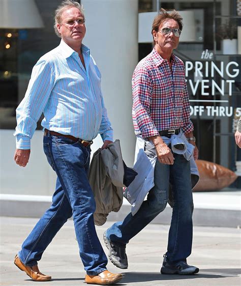 Sir Cliff Richard, 75, appears frail and forlorn during rare public outing with male pal ...