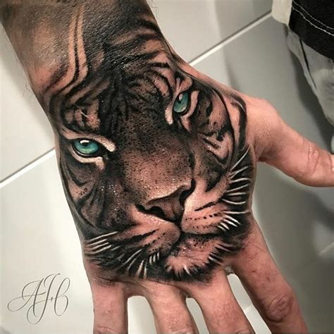 Pin by AGVBOND . on Tattoo Art | Tiger hand tattoo, Lion hand tattoo ...