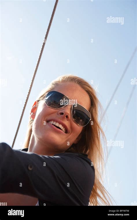 woman with sunglasses smiling Stock Photo - Alamy