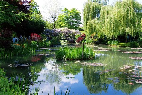 Travel to Claude Monet Water Lily Pond in Giverny France Japanese bridge 03