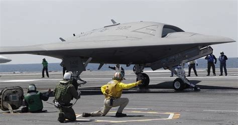 T.O.T. Private consulting services: Navy drone X-47B lands on carrier deck in historic first