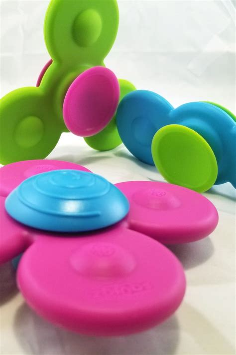 The large floppy arms are perfect for teething. Connect to hard surfaces and watch them spin at ...