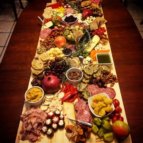Love this giant antipasto platter / cheese board / grazing table / grazing board idea from ...
