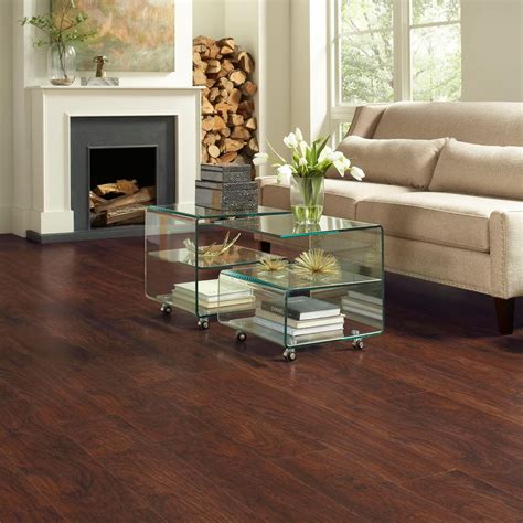 TrafficMaster Dark Brown Hickory 7 mm T x 8-1/32 in. W x 47-5/8 in. L Laminate Flooring (23.91 ...