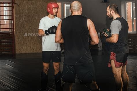 Training of athletes boxers in the gym Stock Photo by olgar23 | PhotoDune