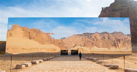 maraya concert hall appears as a giant mirrored mirage in the desert