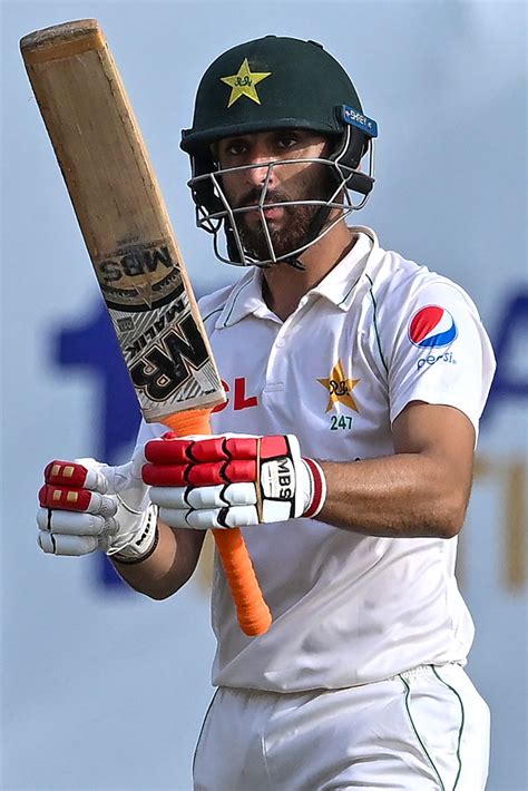 Agha Salman acknowledges the cheers after getting to his half-century | ESPNcricinfo.com