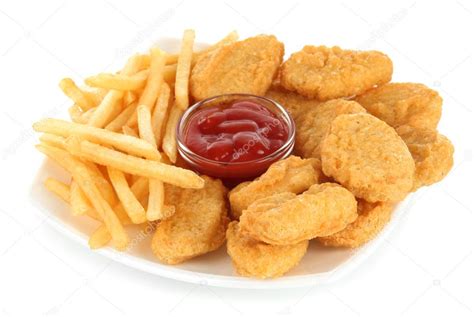 Fried chicken nuggets with french fries and sauce isolated on white Stock Photo by ©belchonock ...