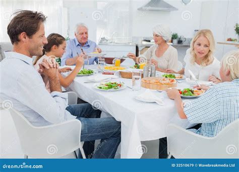 Extended Family At The Dinner Table Royalty Free Stock Images - Image ...