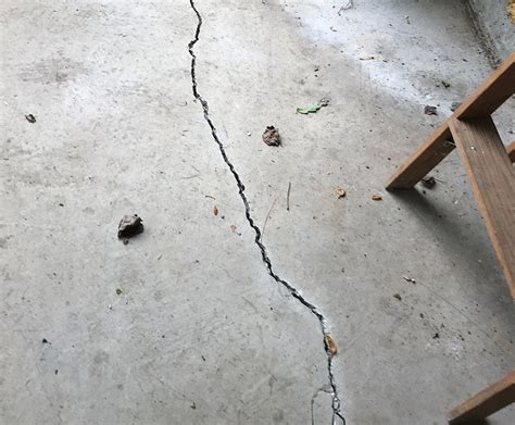 Basement Floor Cracks | Cracked Foundation Solutions | JES