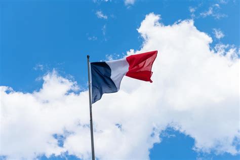 French flag waving in the wind 9253044 Stock Photo at Vecteezy