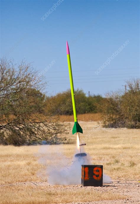 Model rocket launch - Stock Image - C058/4019 - Science Photo Library