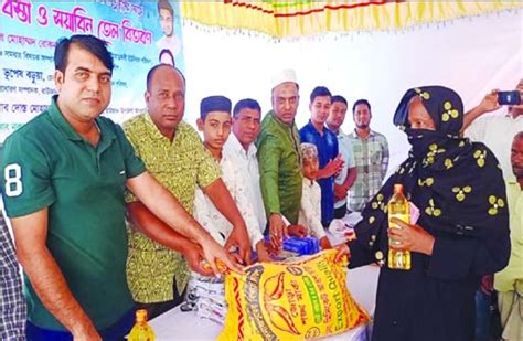 Pahartali Union Chairman of Raozan Upazila Md Rokanuddin distributing ...