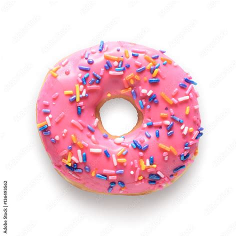 Pink frosted donut with colorful sprinkles isolated on white bac Stock Photo | Adobe Stock