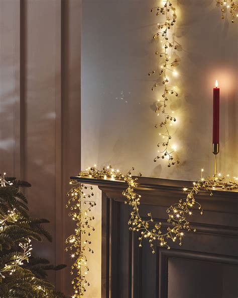 Golden Bell Christmas Garland String Lights | Oliver Bonas