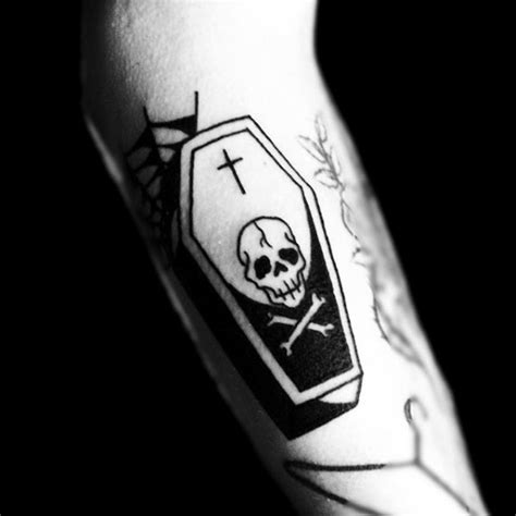 Simple tiny black and white coffin stylized with skull and cross tattoo ...